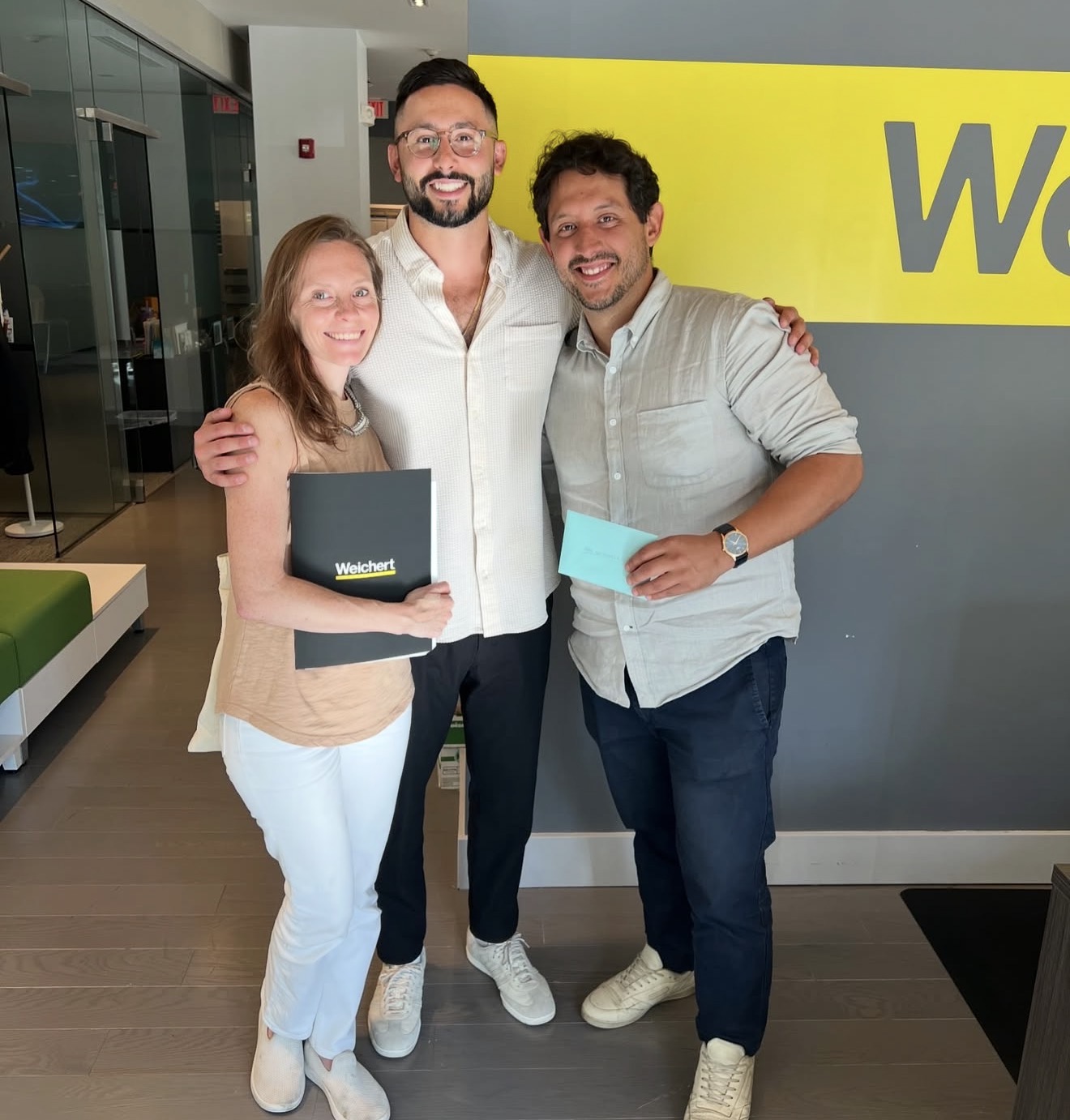 Anthony Iemmello with clients on closing day
